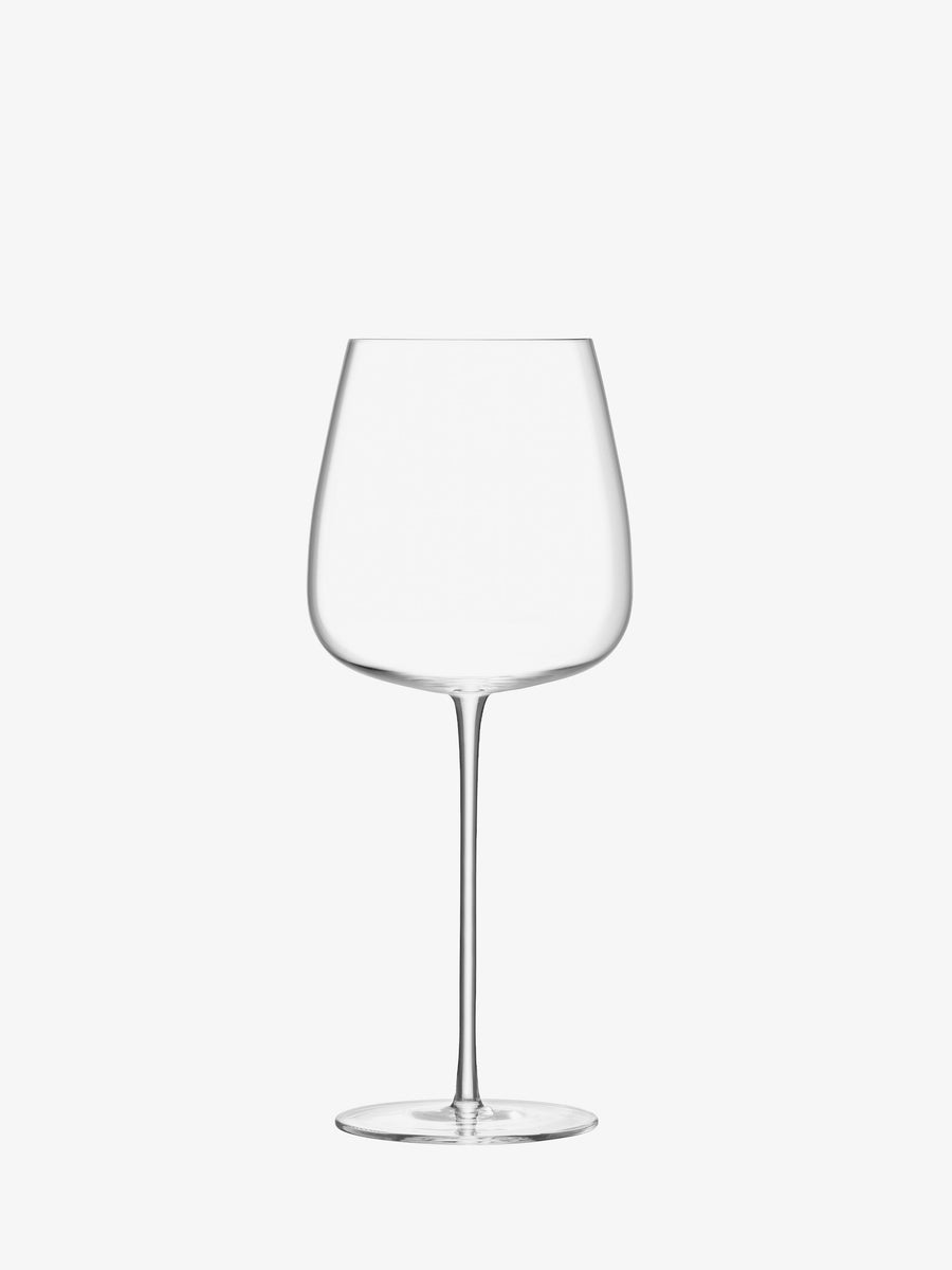 A single lsa-international Red Wine Goblet, featuring a long stem and wide bowl, is meticulously hand crafted and displayed against a plain white background.