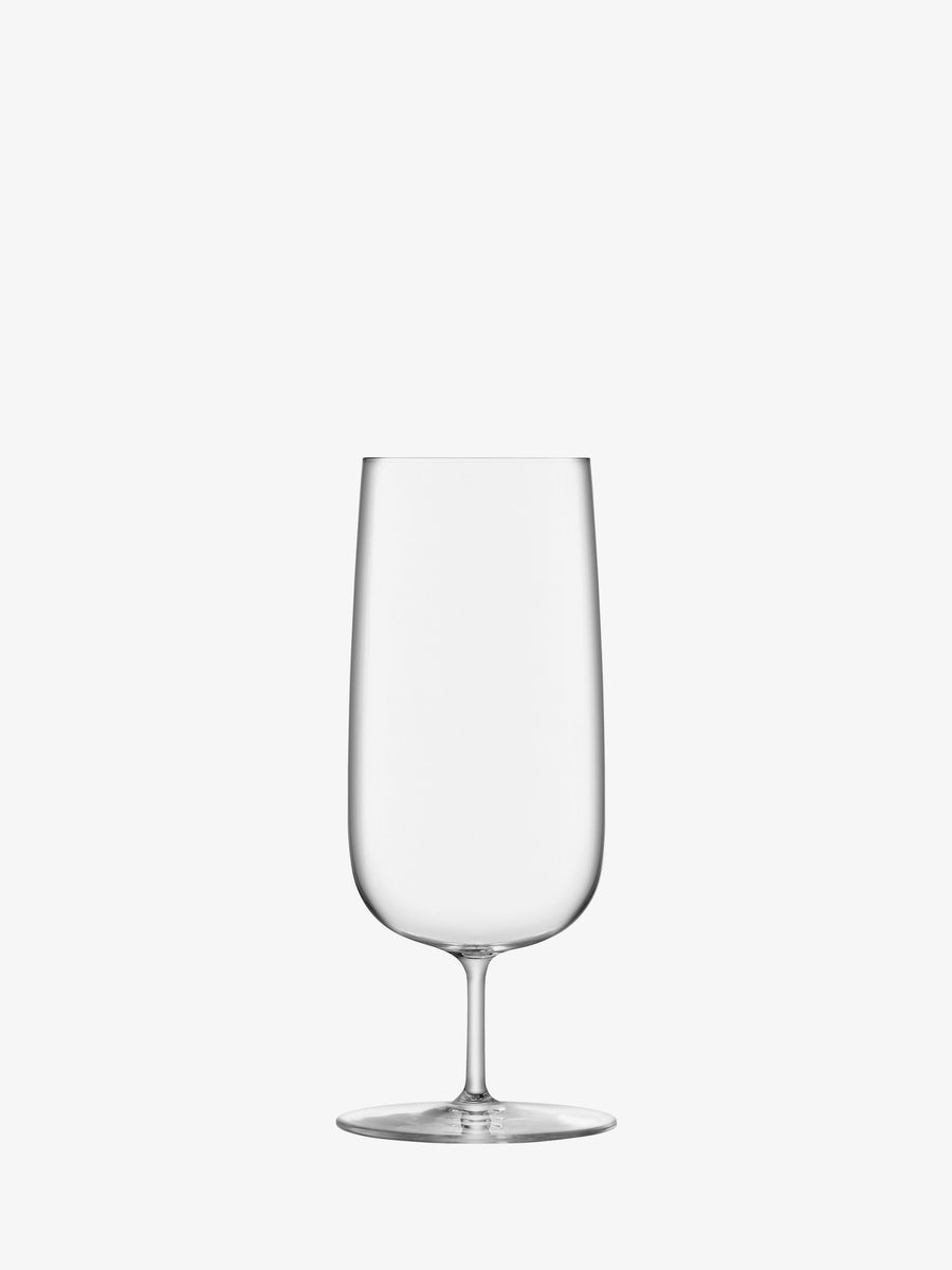 A clear, empty Pilsner Glass by lsa-international, featuring a thin stem and wide base, crafted from crystalline glass and set against a plain white background.