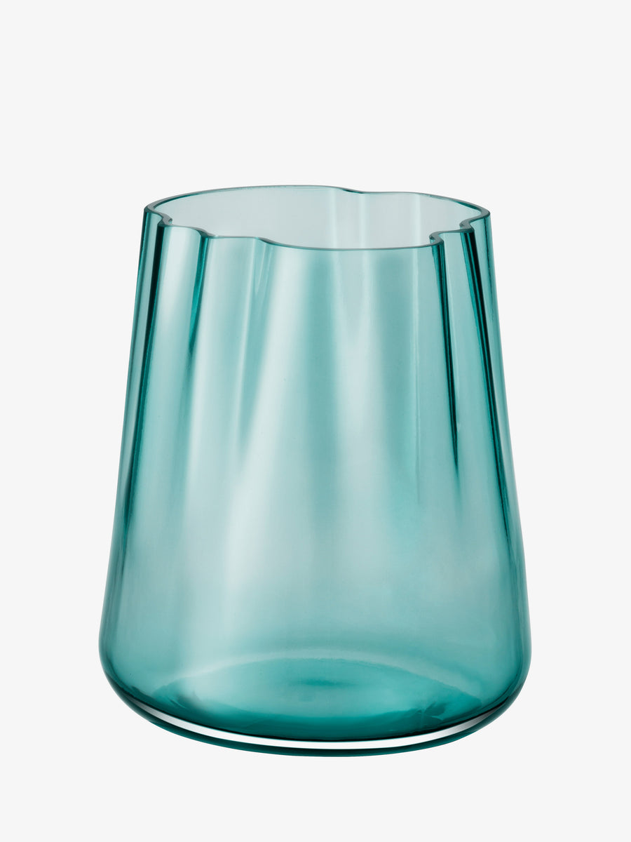 A translucent turquoise Vase/Lantern by lsa-international, mouth-blown with a smooth, rounded shape and a wavy, uneven rim, displayed on a plain white background.