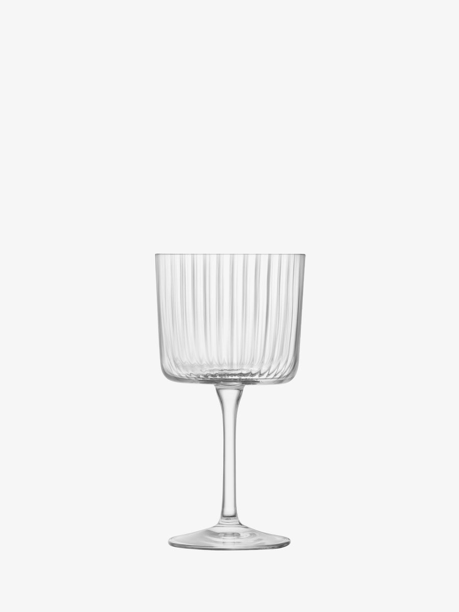 The lsa-international Wine Glass, with a clear and empty bowl adorned with vertical grooves reminiscent of modern wine glass designs, features a thin stem and a flat base, displayed against a plain white background.