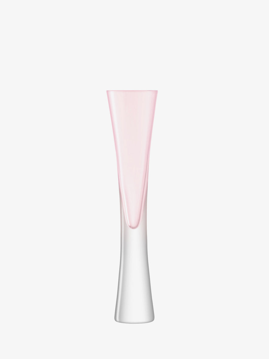 A tall, slender, clear glass “Champagne Flute” by lsa-international features a delicate soft pink tint at the rim that gradually fades to clear toward the base—evoking the graceful design of mouth-blown champagne flutes—and is displayed against a plain white background.