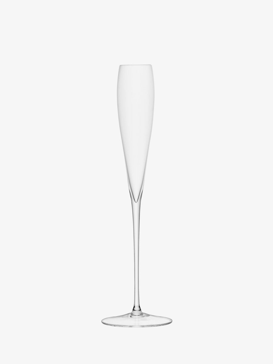 A single Grand Champagne Flute by lsa-international, crafted from clear glass with a hand-drawn stem, stands upright on a white background.