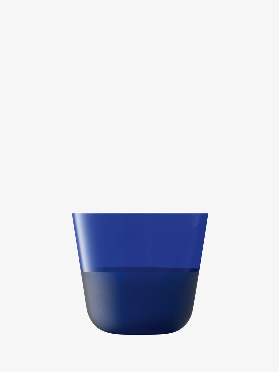 A modern, minimalist blue tumbler with a glossy finish—crafted from soda-lime glass by lsa-international—sits against a plain white background. The tumbler has straight sides and a slightly flared rim.