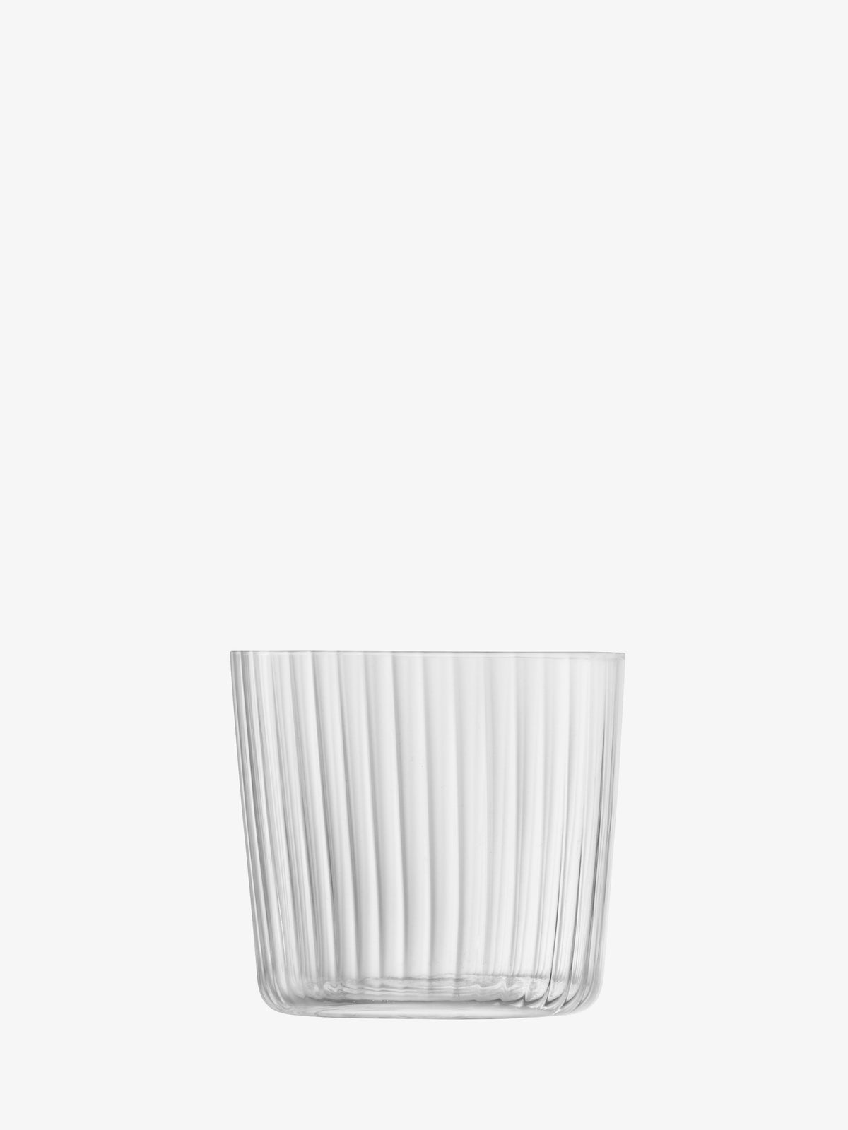 A fine-walled Tumbler by lsa-international, featuring vertical ridges and a clear, short glass design, is displayed against a plain white background.