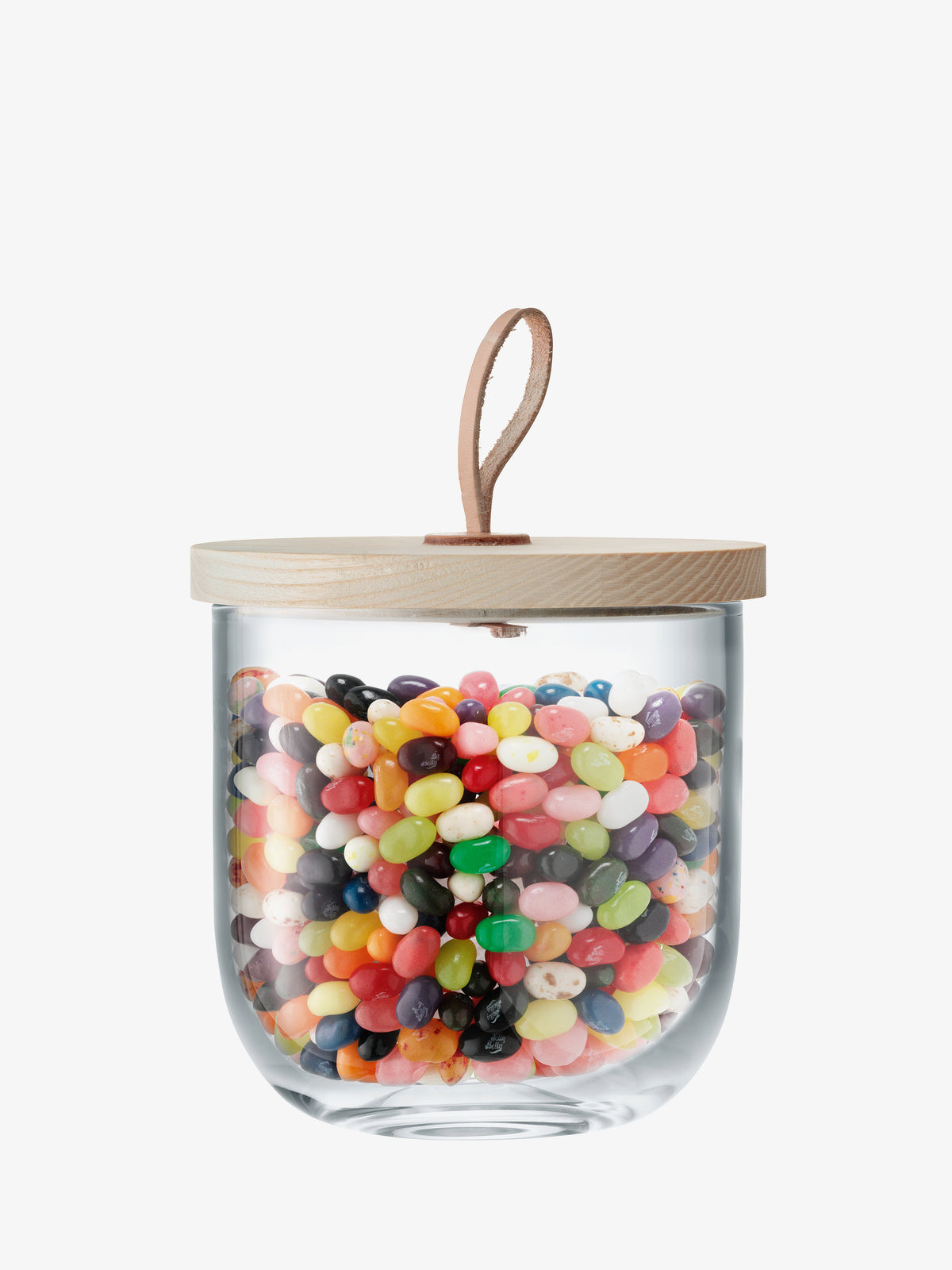 An LSA International Container & Ash Lid filled with colorful jelly beans, featuring a round wooden lid and a leather hanging loop.