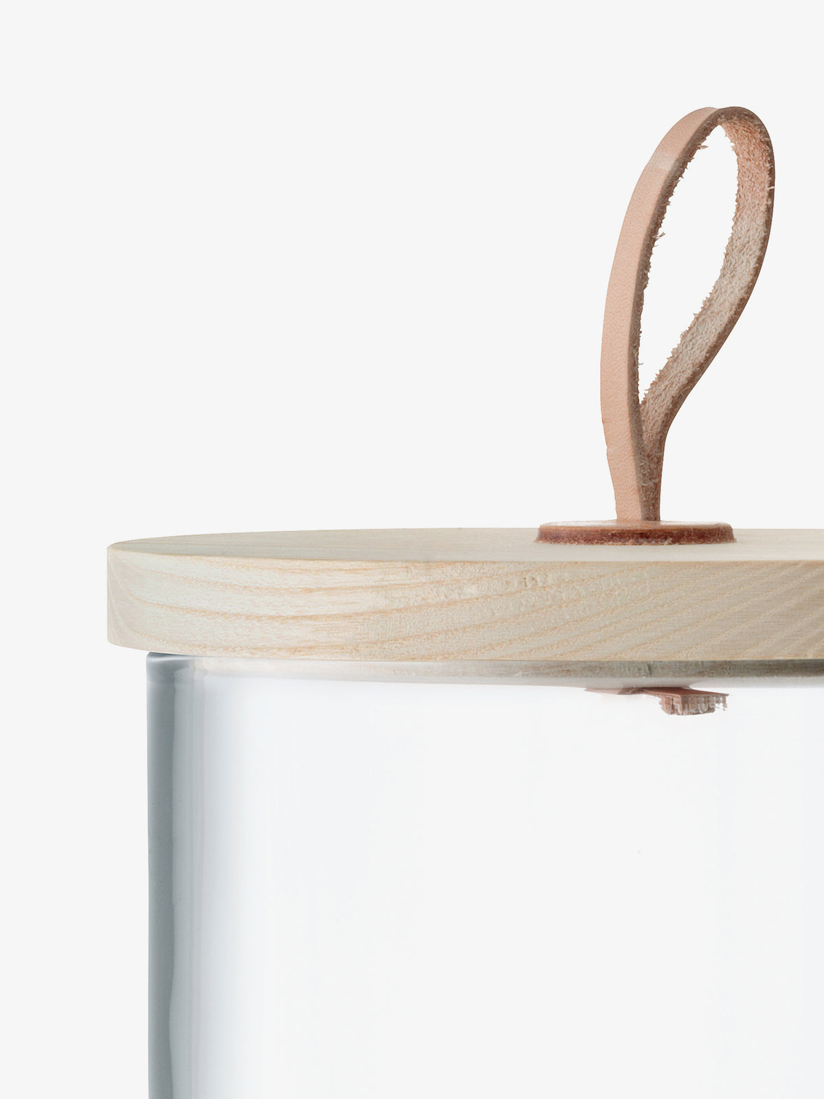 LSA International Container & Ash Lid: a clear glass storage jar with a sustainably-sourced ash lid and a leather loop handle.