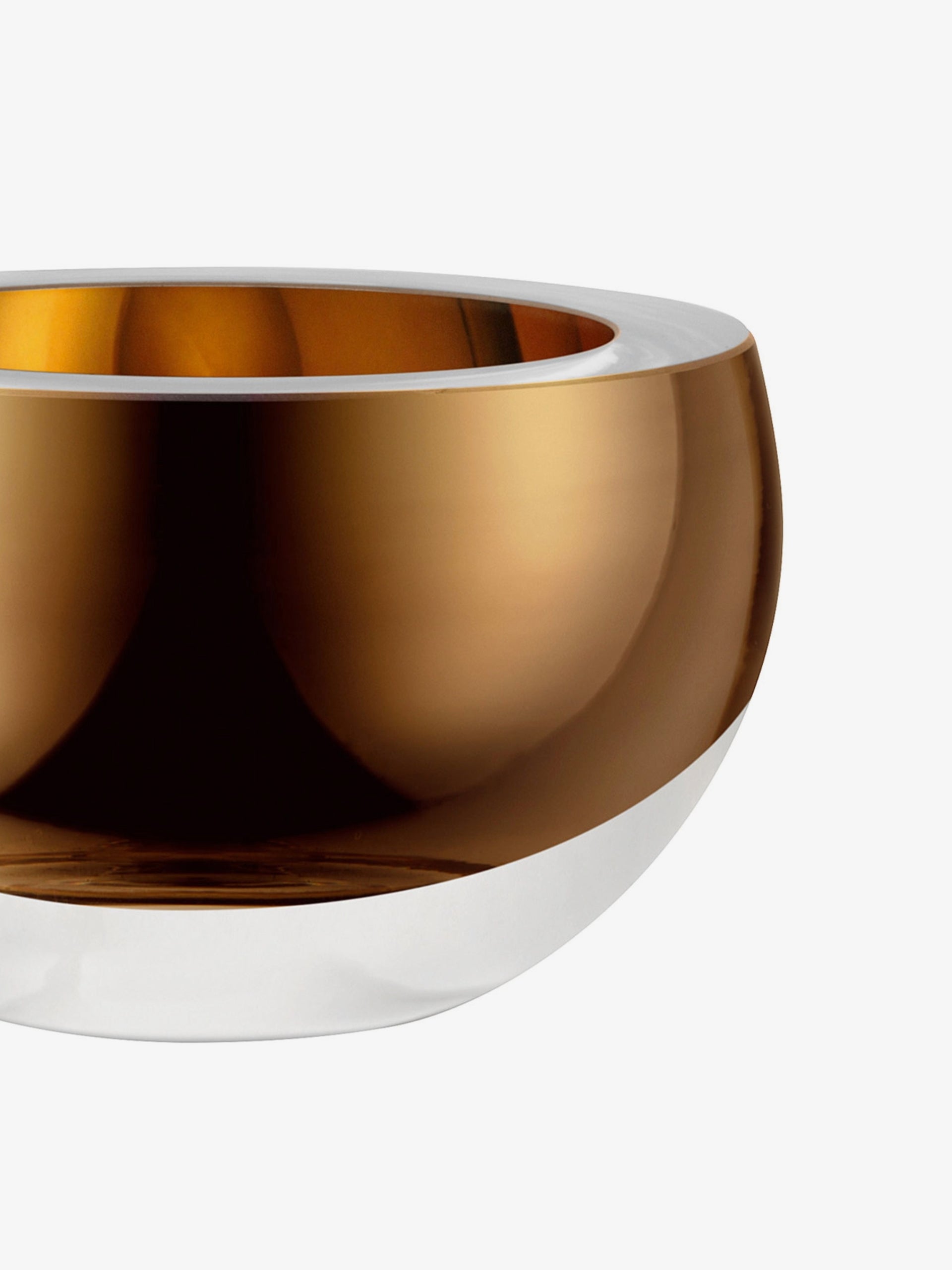 A round, modern bowl with a reflective copper-colored upper half and a clear glass lower half, set against a plain white background.