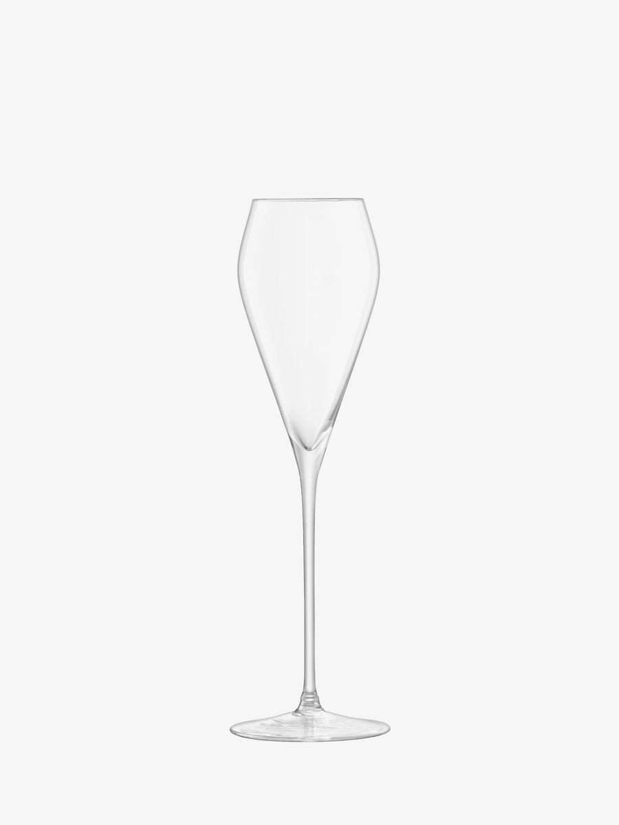 A clear, empty lsa-international Prosecco Glass features a tall, hand-drawn stem and a gently curved bowl, set against a plain white background.