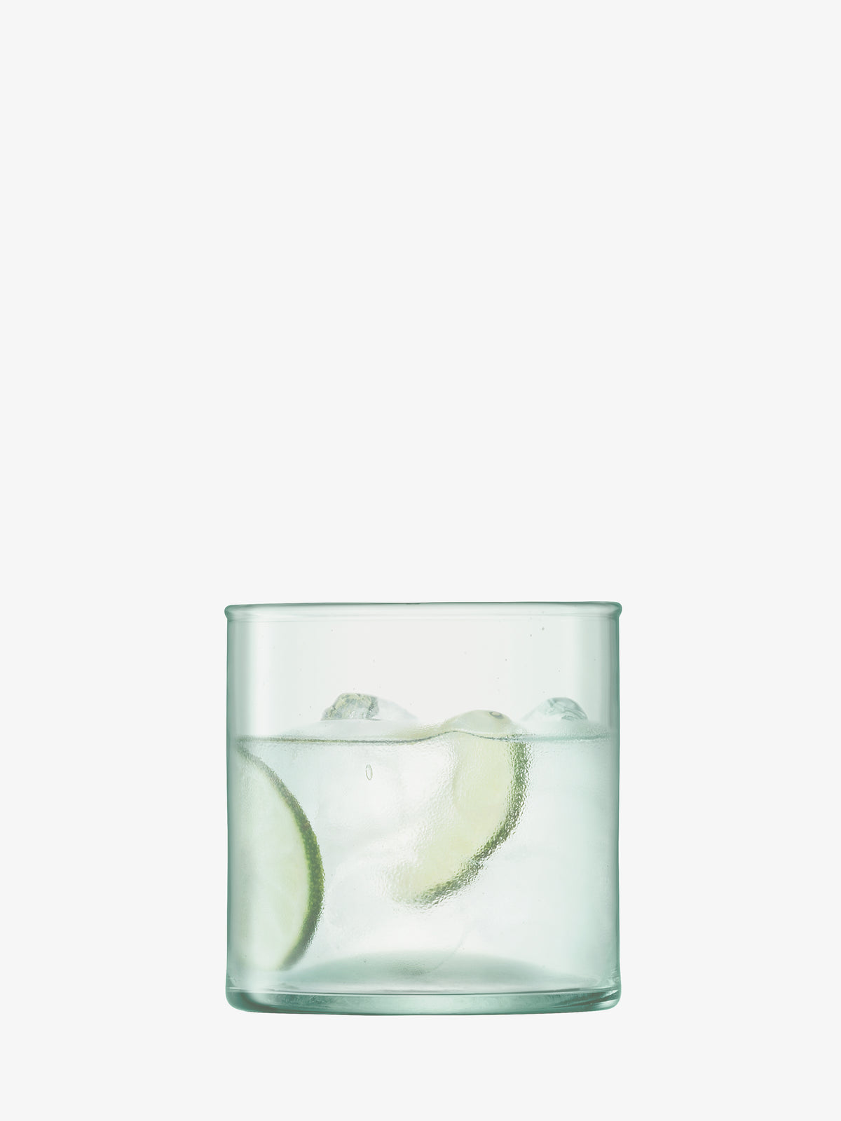 A lsa-international Tumbler, filled with ice cubes, water, and lime slices, is set against a plain white background.