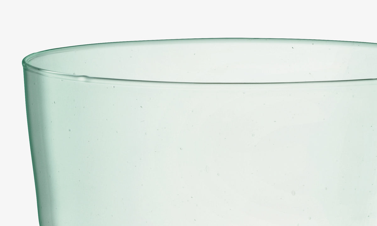 Close-up of the upper portion of the lsa-international Self Watering Planter Clear/Part Optic, made from transparent recycled glass, against a white background.