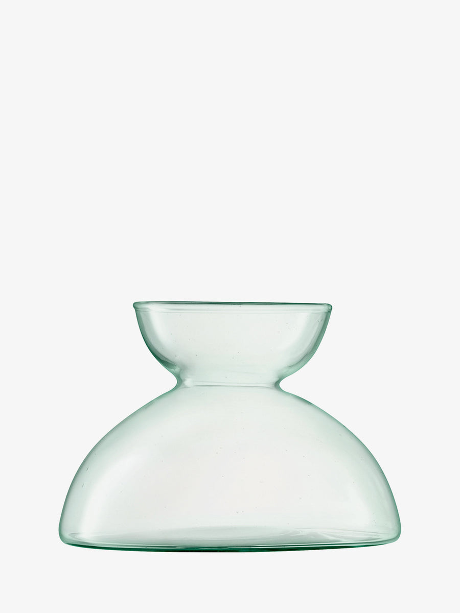A transparent, light green recycled glass vase by lsa-international features a wide round base and a narrow, flared opening, displayed against a plain white background.