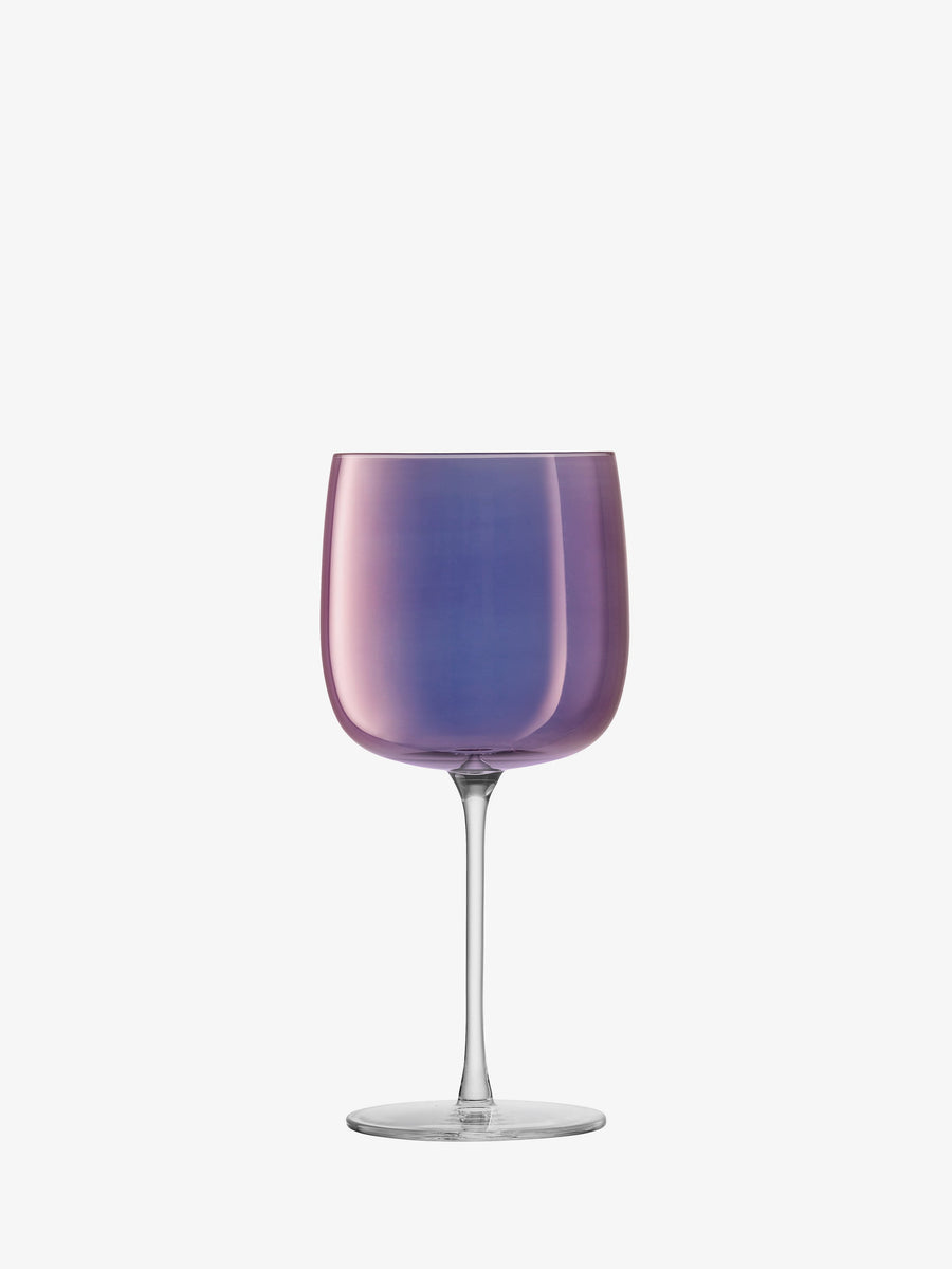 The lsa-international Wine Glass features a wide bowl and tall, slender stem with a reflective violet lustre—showcasing a purple and pink gradient tint on the bowl—set against a plain white background; perfect for those who appreciate contemporary wine glasses.