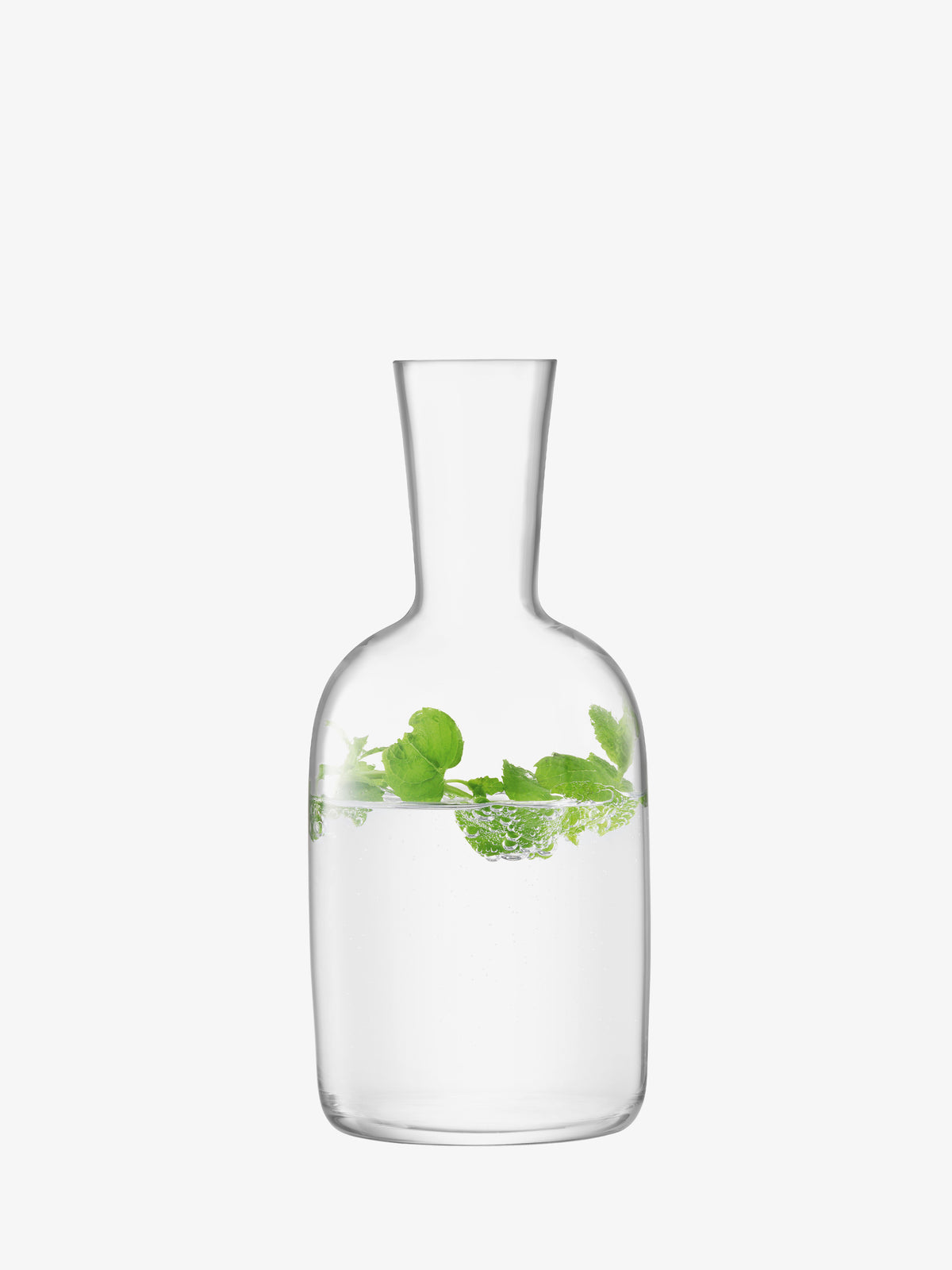 The lsa-international Water Carafe, featuring mouth-blown clear glass with tall straight sides and a gracefully flared neck, is elegantly filled with water and fresh green mint leaves. Set against a plain white background, the carafe’s minimalist design highlights the refreshing simplicity of the scene.