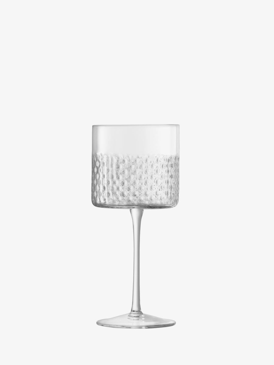 The lsa-international Wine Glass features a clear, dimpled lower bowl reminiscent of fine textured glass, a smooth upper rim, and is set on a slender stem with a flat base, shown against a plain white background.