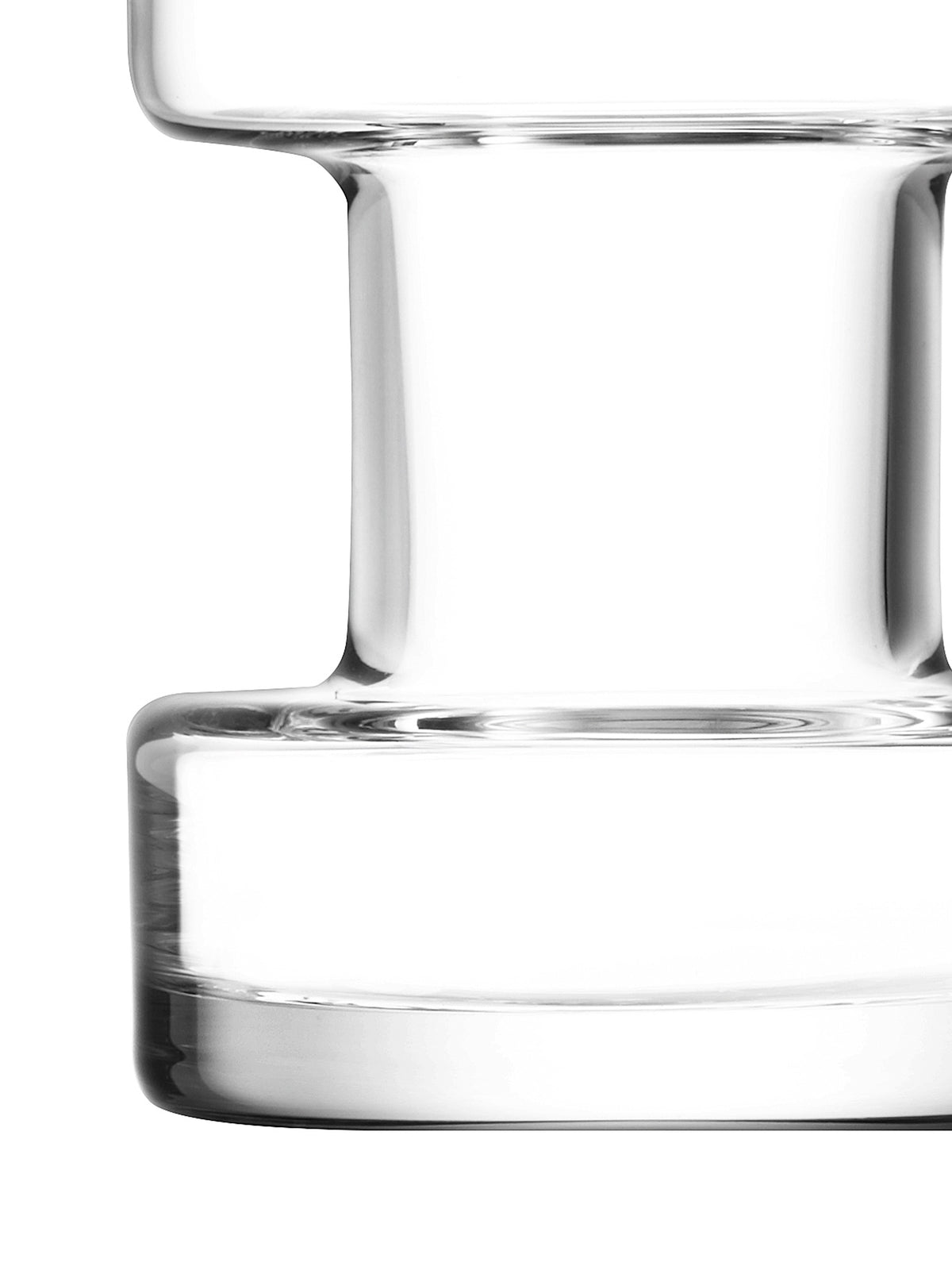 Close-up of a Five Mini Vase Set piece, a mouth-blown glass vase with a thick base and an hourglass-shaped neck reminiscent of Brutalist architecture.