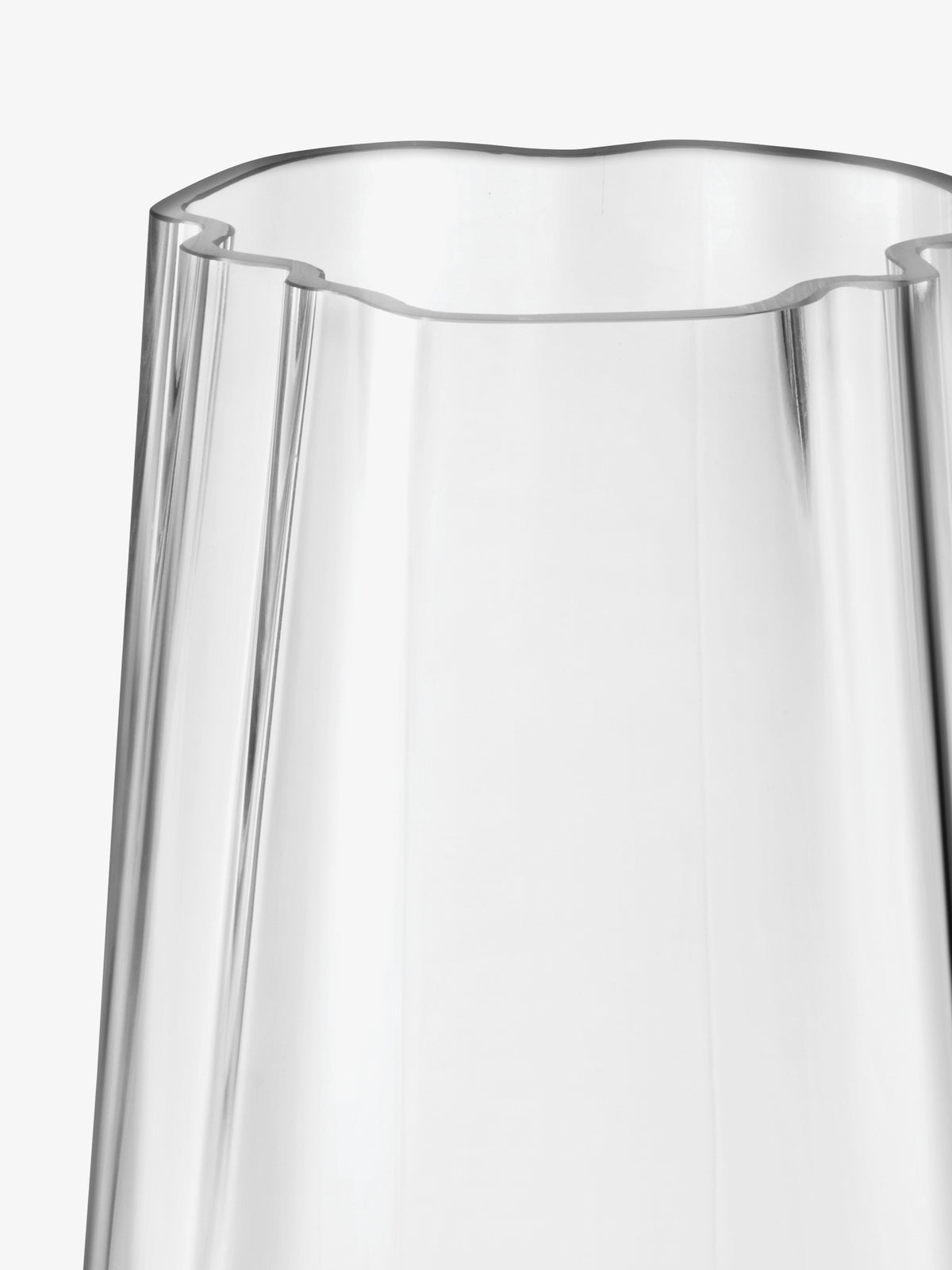 LSA-International Vase/Lantern made of clear glass with an organic form, featuring a fluted, wavy rim and vertical molded ridges.