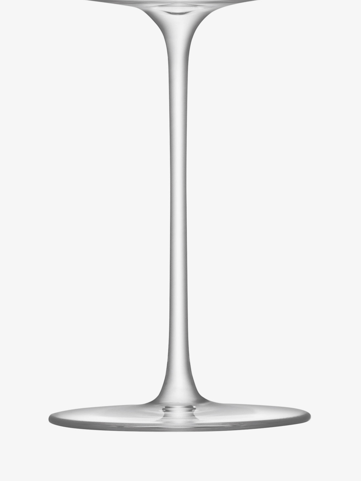 A close-up of the stem and base of an empty clear crystalline Grand Cru Glass by lsa-international against a white background.
