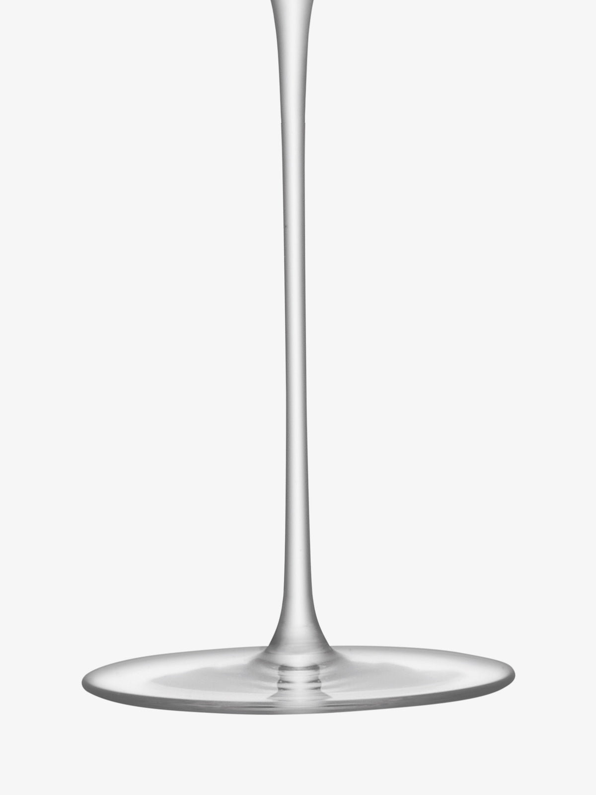 A close-up of the elegant stem and base of the Grand Cru Glass by lsa-international, crafted from crystalline glass, set against a plain white background.