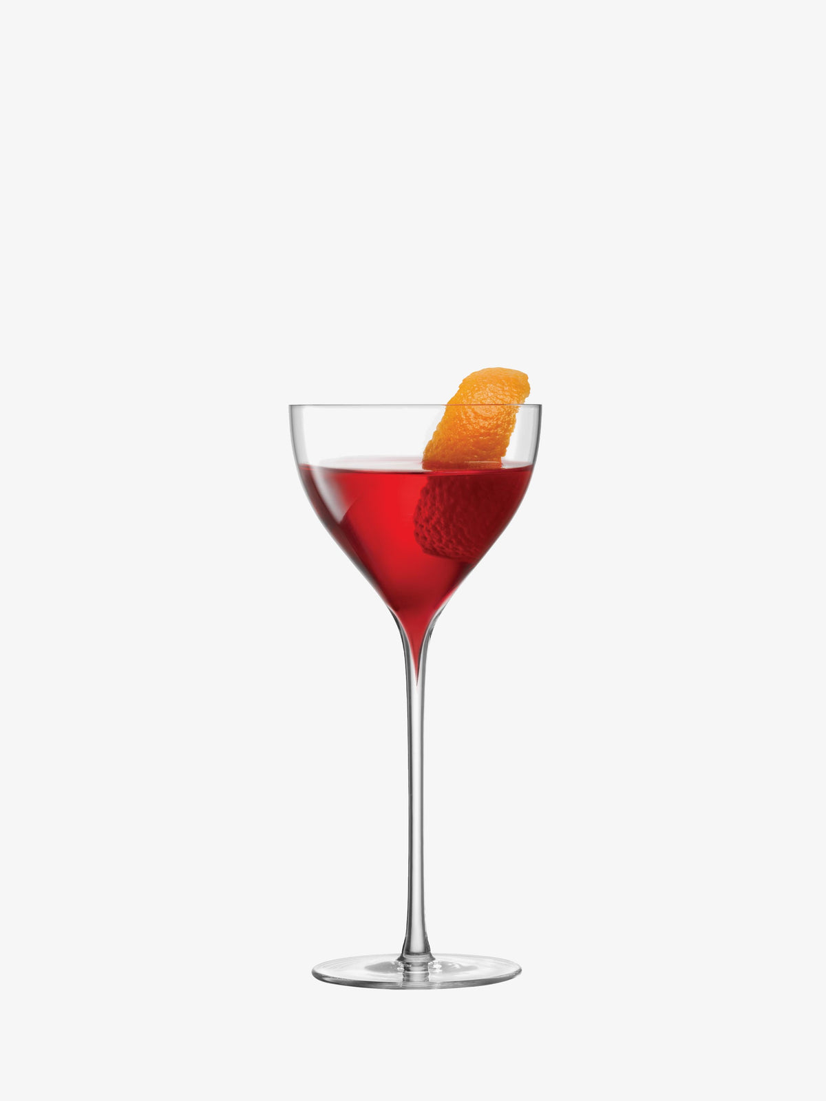 A lsa-international Nick & Nora Glass filled with a red cocktail and garnished with an orange twist, set against a plain white background.