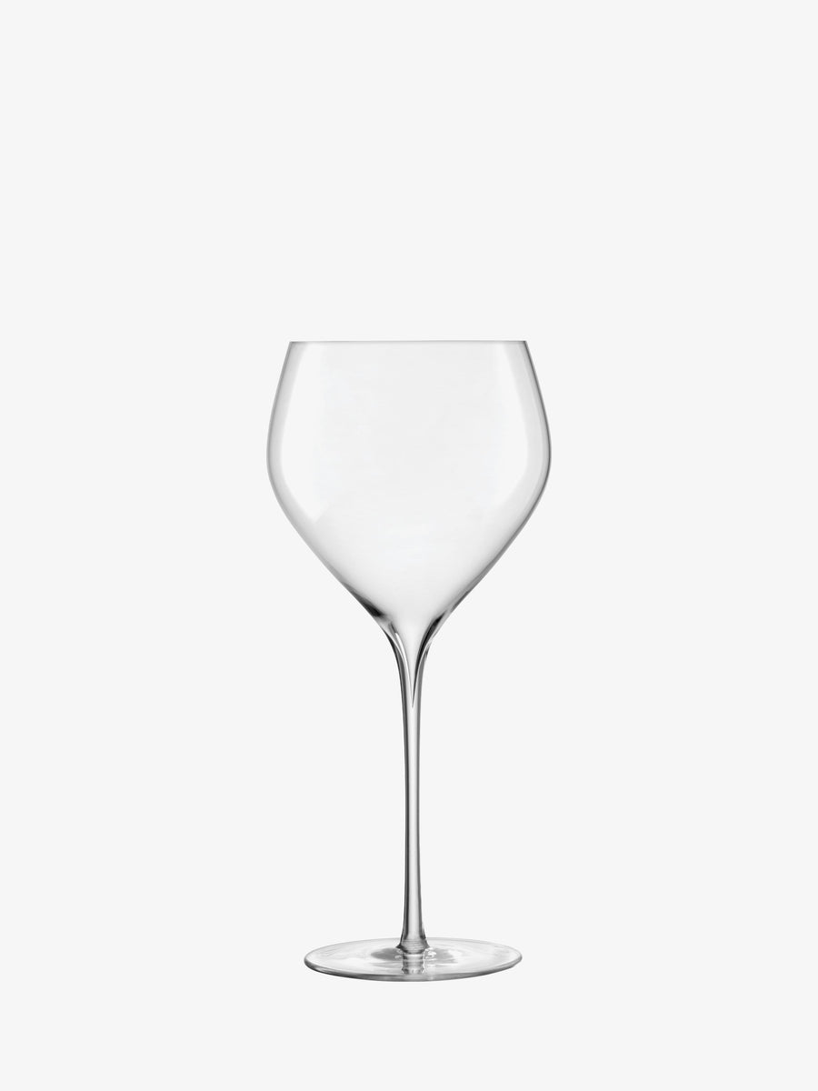A clear, empty lsa-international Red Wine Glass with a long, hand-drawn stem and a finely curved bowl is set against a plain white background—an exquisite example of mouth-blown glassware.