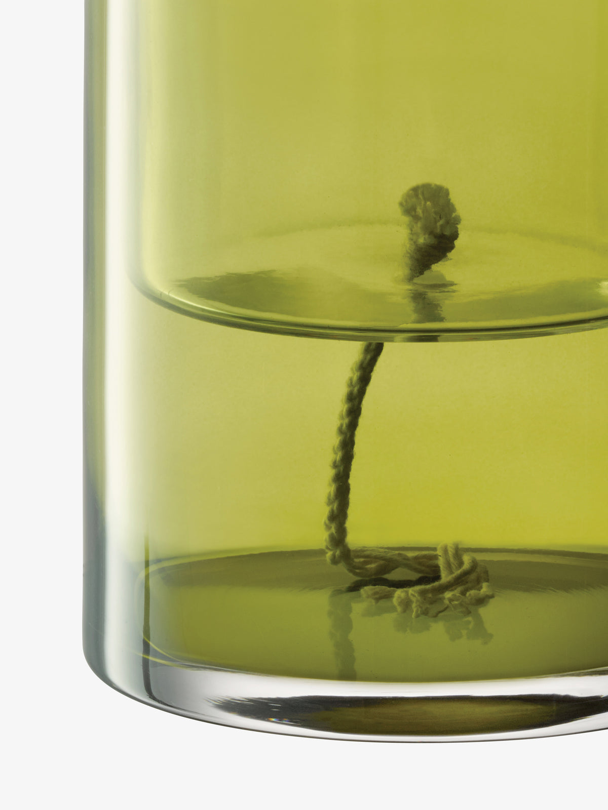 A lime-green glass lsa-international Self Watering Planter with a cotton wick hanging from an inner shelf.