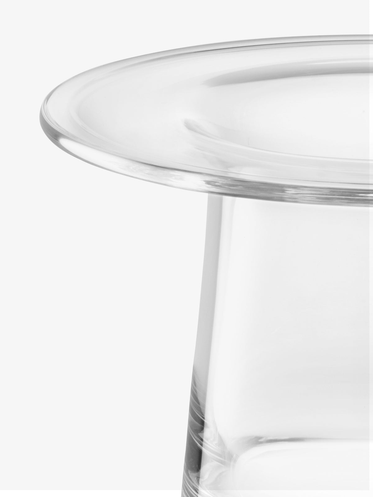 Close-up of a mouth-blown LSA International Victoria vase, featuring a clear glass body and a wide, flared rim.