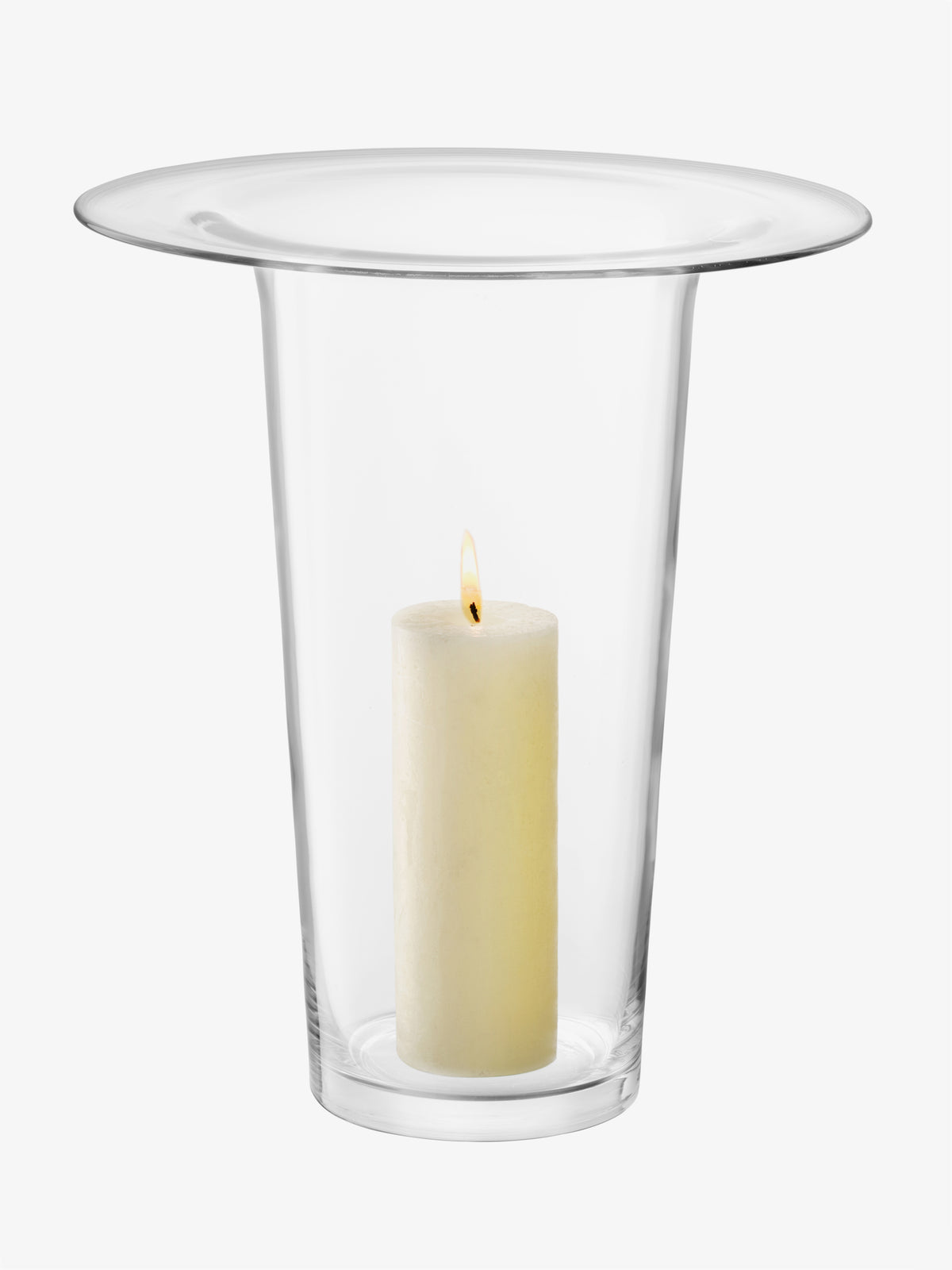 LSA International Vase/Lantern, a clear glass hurricane vase containing a single lit pillar candle, perfect for centrepiece displays.