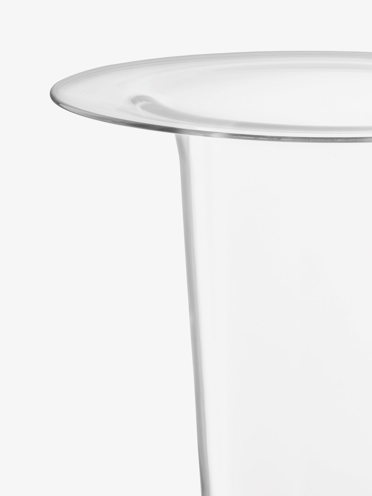 Close-up of a large mouth-blown LSA-International Vase/Lantern with a clear glass body and a wide, flared rim.