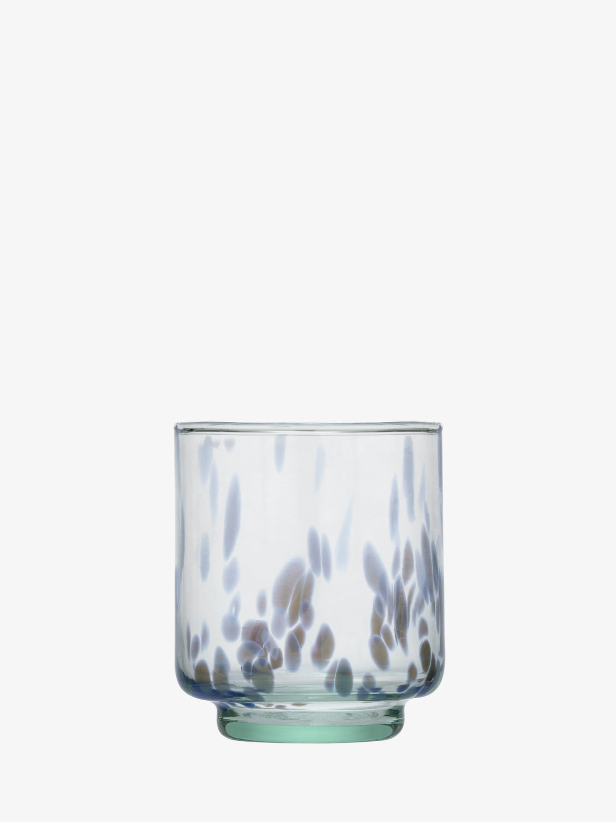 A clear, speckled lsa-international Tumbler with a round base, featuring scattered blue and brown spots on the lower half, set against a white background.