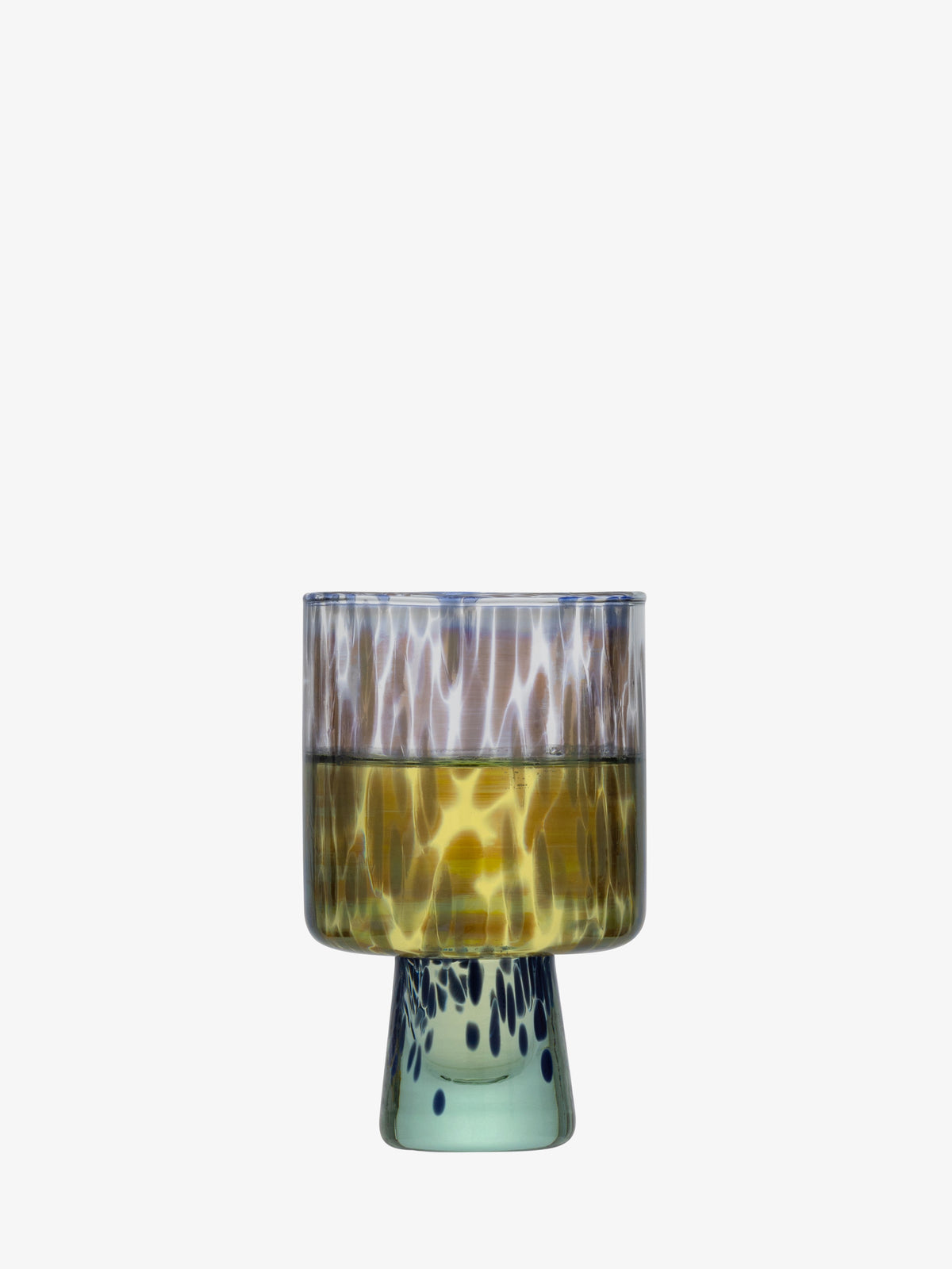 A wine glass by lsa-international, expertly crafted from recycled glass, features a wide rim and a mottled pattern of yellow, blue, and green colors. It stands on a short, sturdy base against a plain white background.