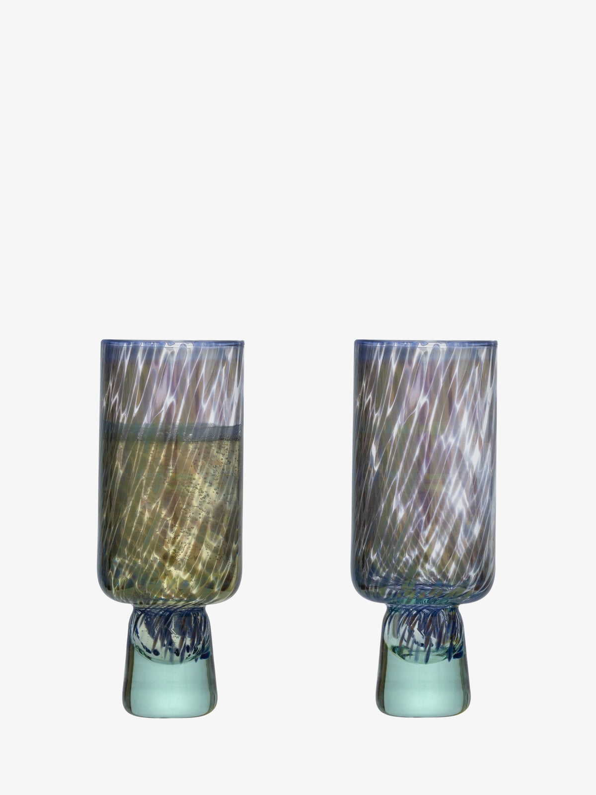 Two tall, cylindrical Flute Glasses by lsa-international stand side by side on clear, rounded bases against a plain white background. Crafted from recycled glass, each flute features a subtle swirl design and a gradient of blue, green, and yellow hues enhanced by a gentle speckled pattern woven into the vibrant colors.
