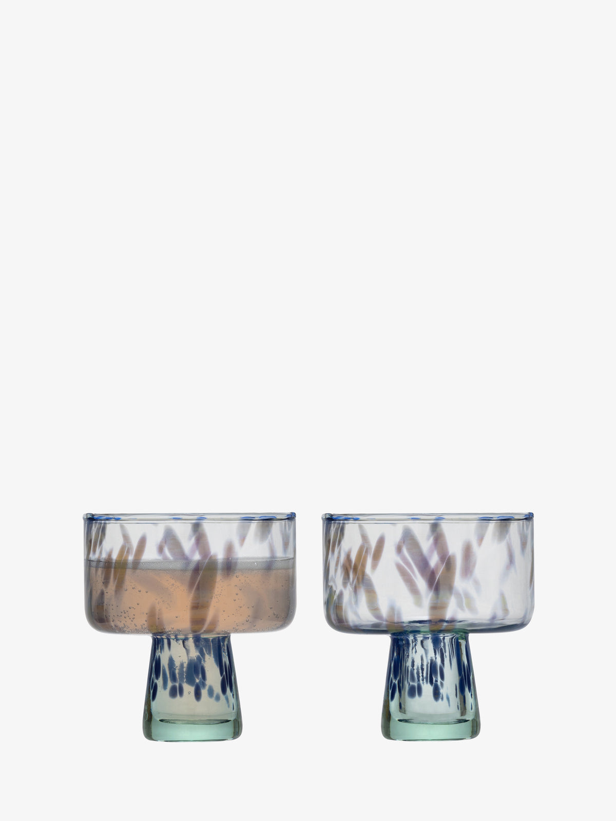 Two lsa-international Cocktail Saucers with blue speckled patterns, reminiscent of sea glass and featuring sturdy bases, are displayed side by side on a white background.