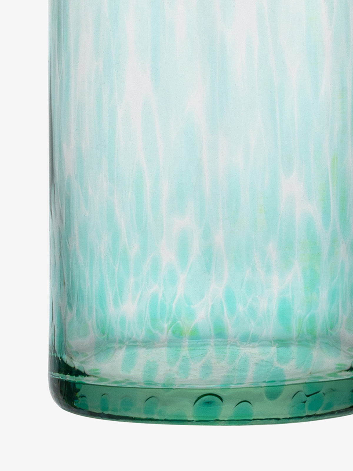 Here is your revised sentence using the provided product data: A close-up of the lsa-international Carafe, showcasing its smooth, cylindrical form with a light green base and distinctive white and green speckled patterns reminiscent of sea glass.