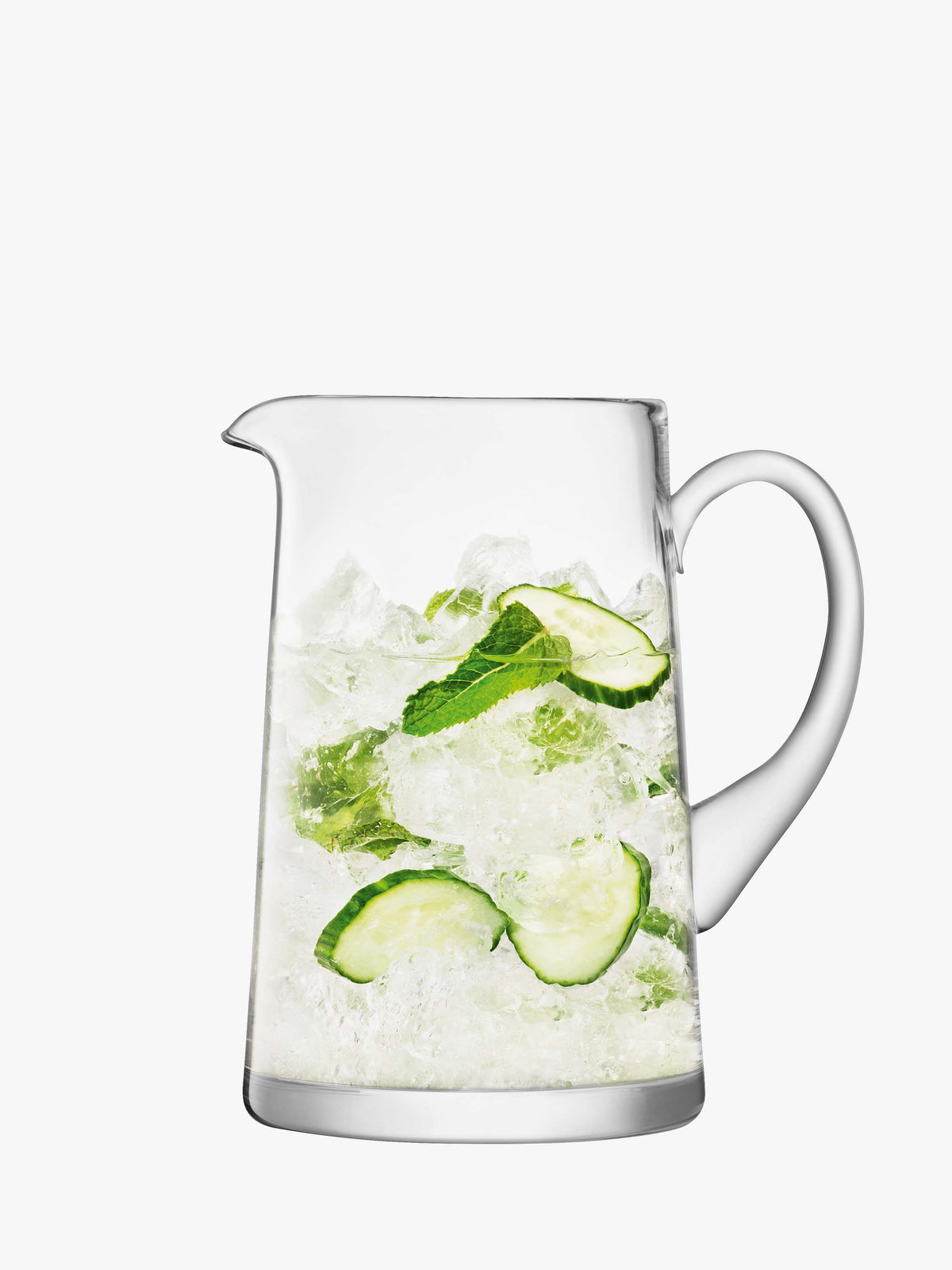A mouth-blown Tapered Jug by lsa-international, filled with crushed ice, cucumber slices, and mint leaves, set against a plain white background.
