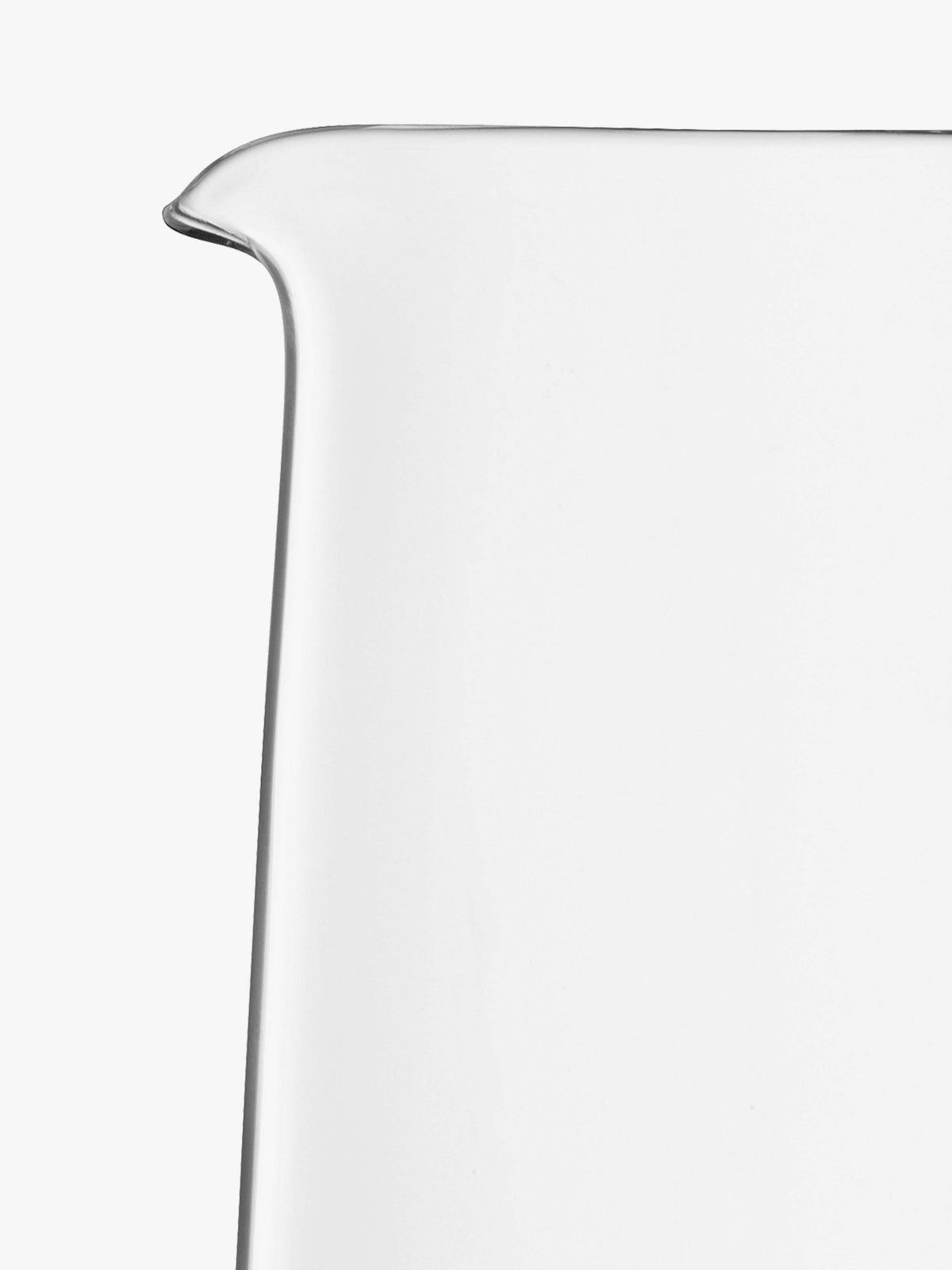 A clear, hand-formed lsa-international Tapered Jug with a spout is shown against a white background, with only the upper left portion visible in the image.