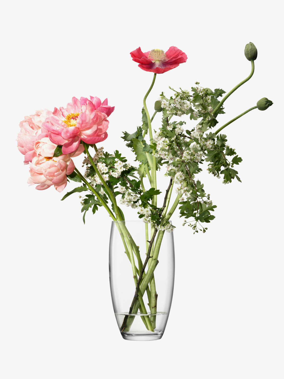 The lsa-international Barrel Bouquet Vase displays pink peonies, red poppy flowers, white filler flowers, and green stems against a white background.