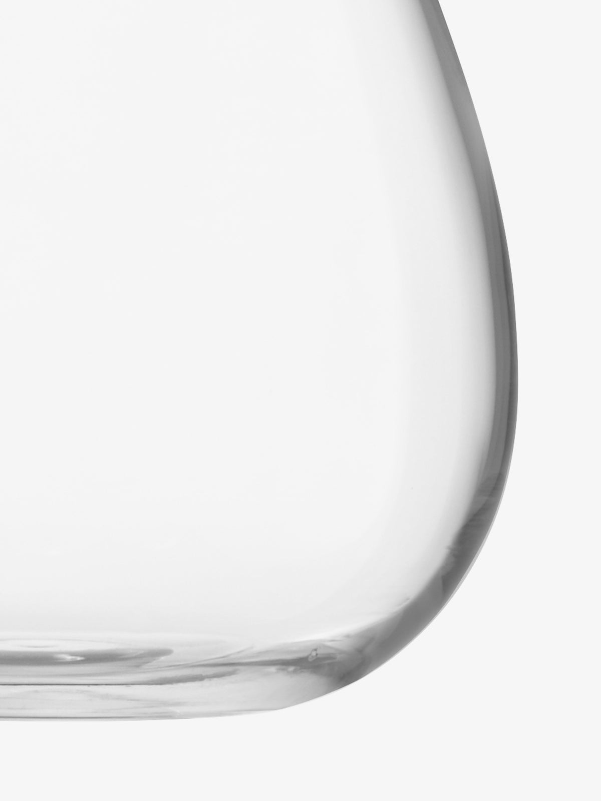 A close-up image of the bottom portion of the Table Bouquet Vase by lsa-international, crafted from clear glass, sitting against a white background.