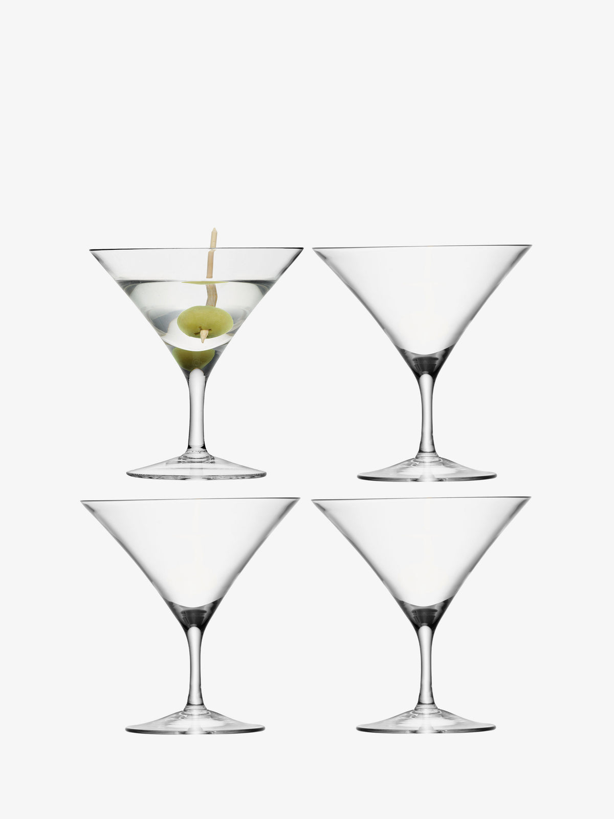 Four lsa-international Martini Glasses are arranged on a white background; only the top left glass is filled with a martini and garnished with an olive, while the remaining three are empty, highlighting their mouthblown handcrafted quality and elegantly steeply sloping bowls.