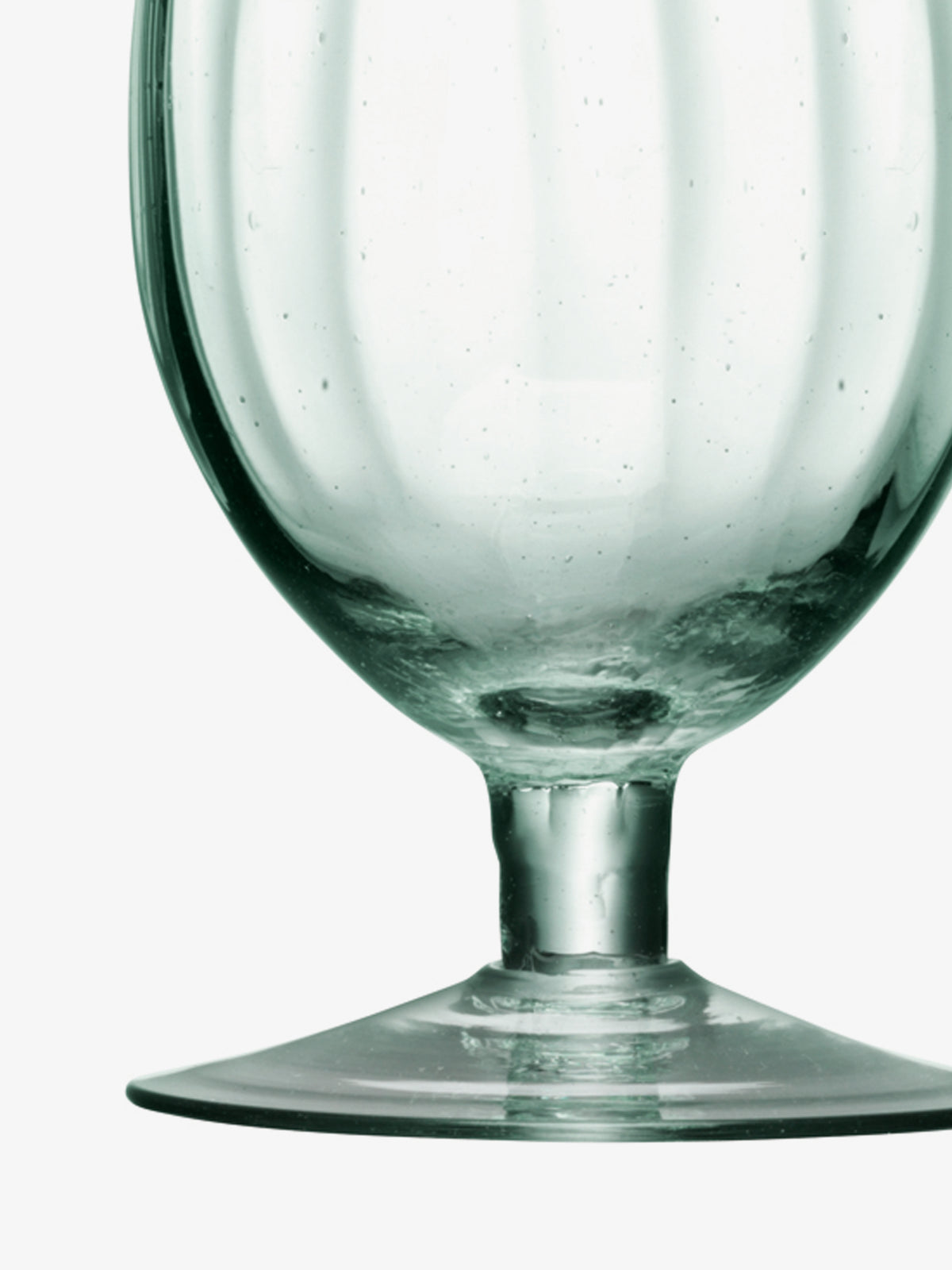 A close-up of a clear recycled glass Wine Glass by lsa-international with a wide bowl and a short stem.