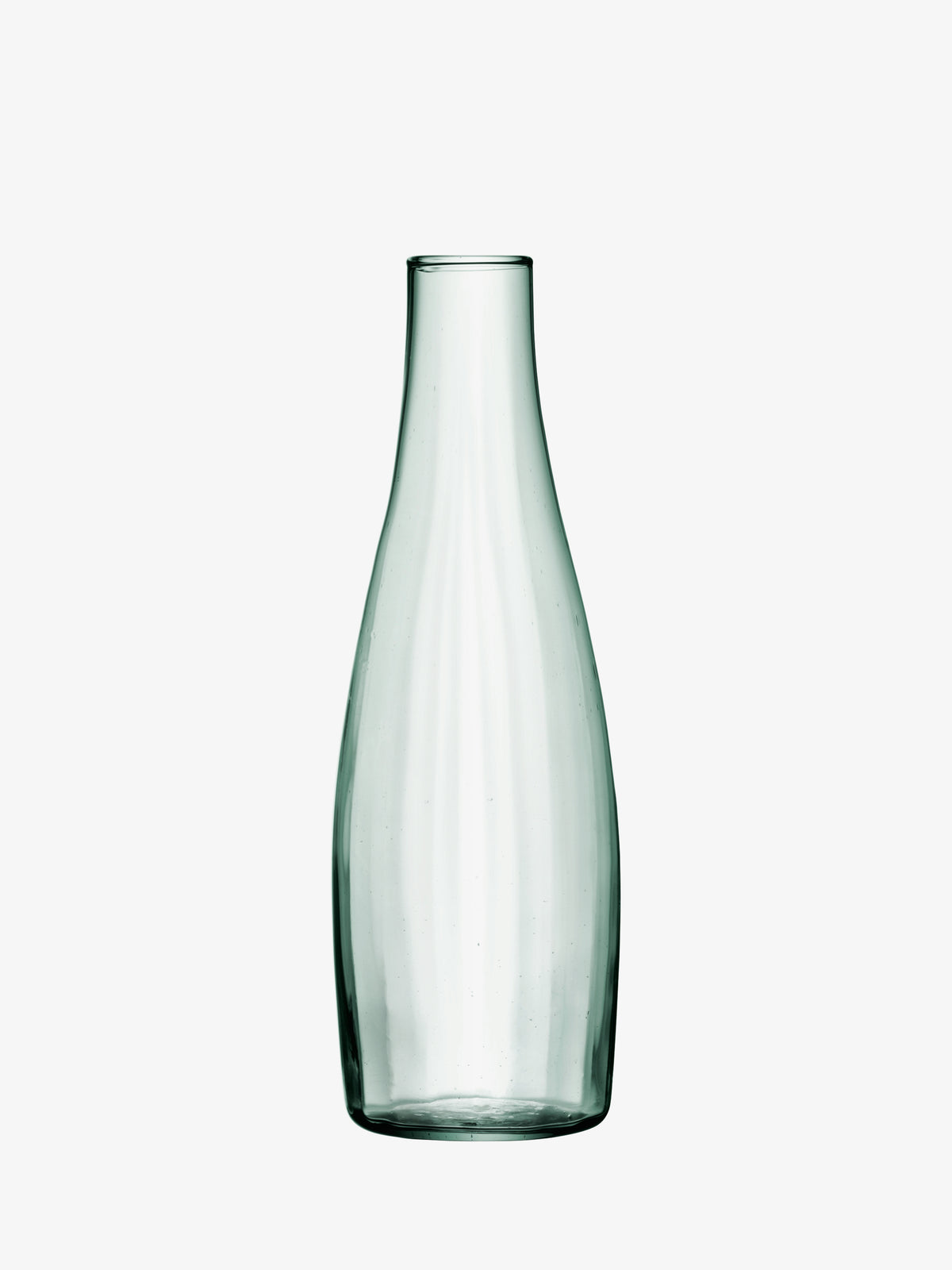 A tall, pale green mouth-blown LSA International Water Carafe with a tapered neck and an empty, carafe-shaped silhouette.