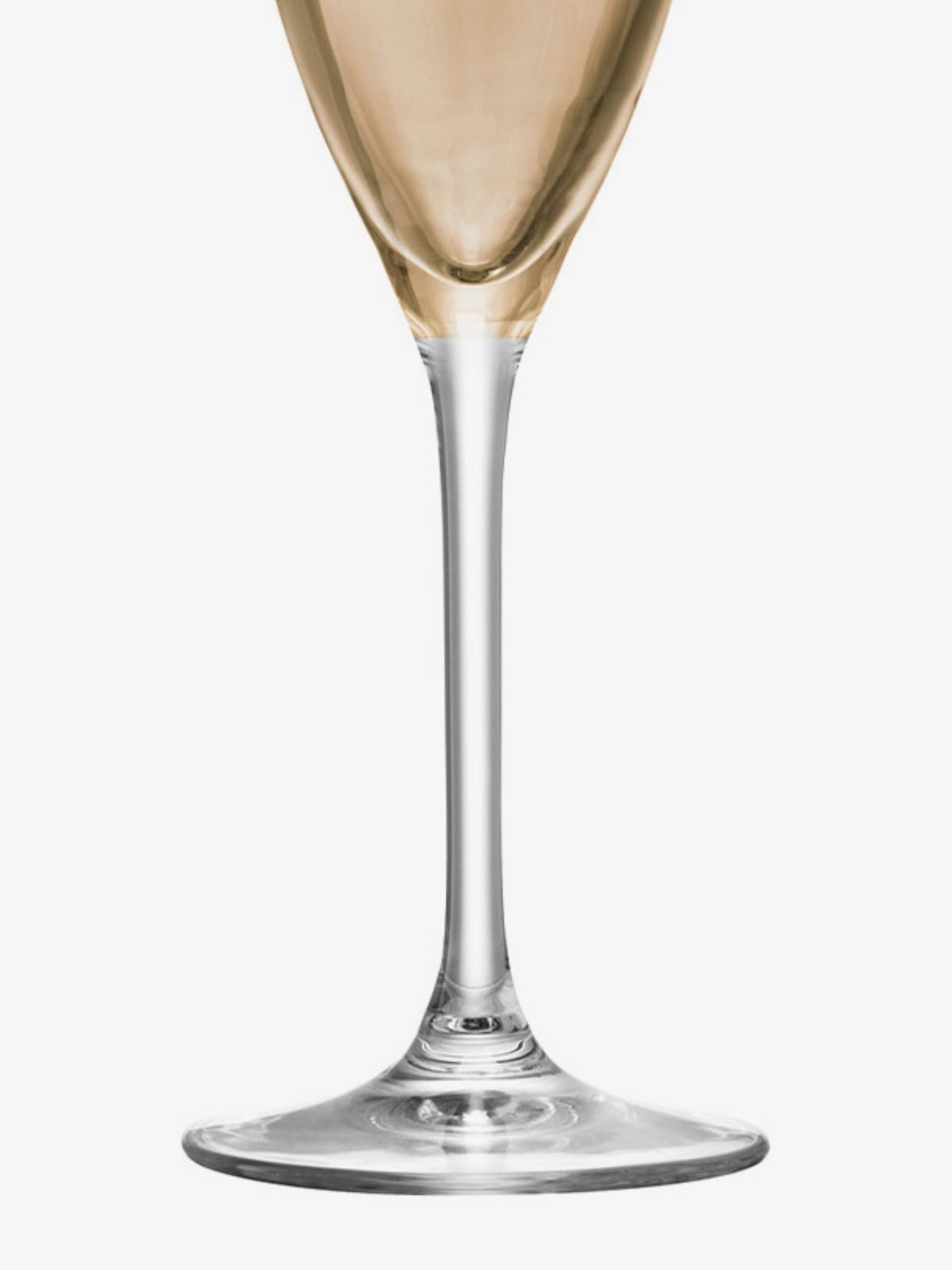 A close-up of the lower half of a clear wine glass with a thin stem and a flat base, partially filled with a light golden liquid.
