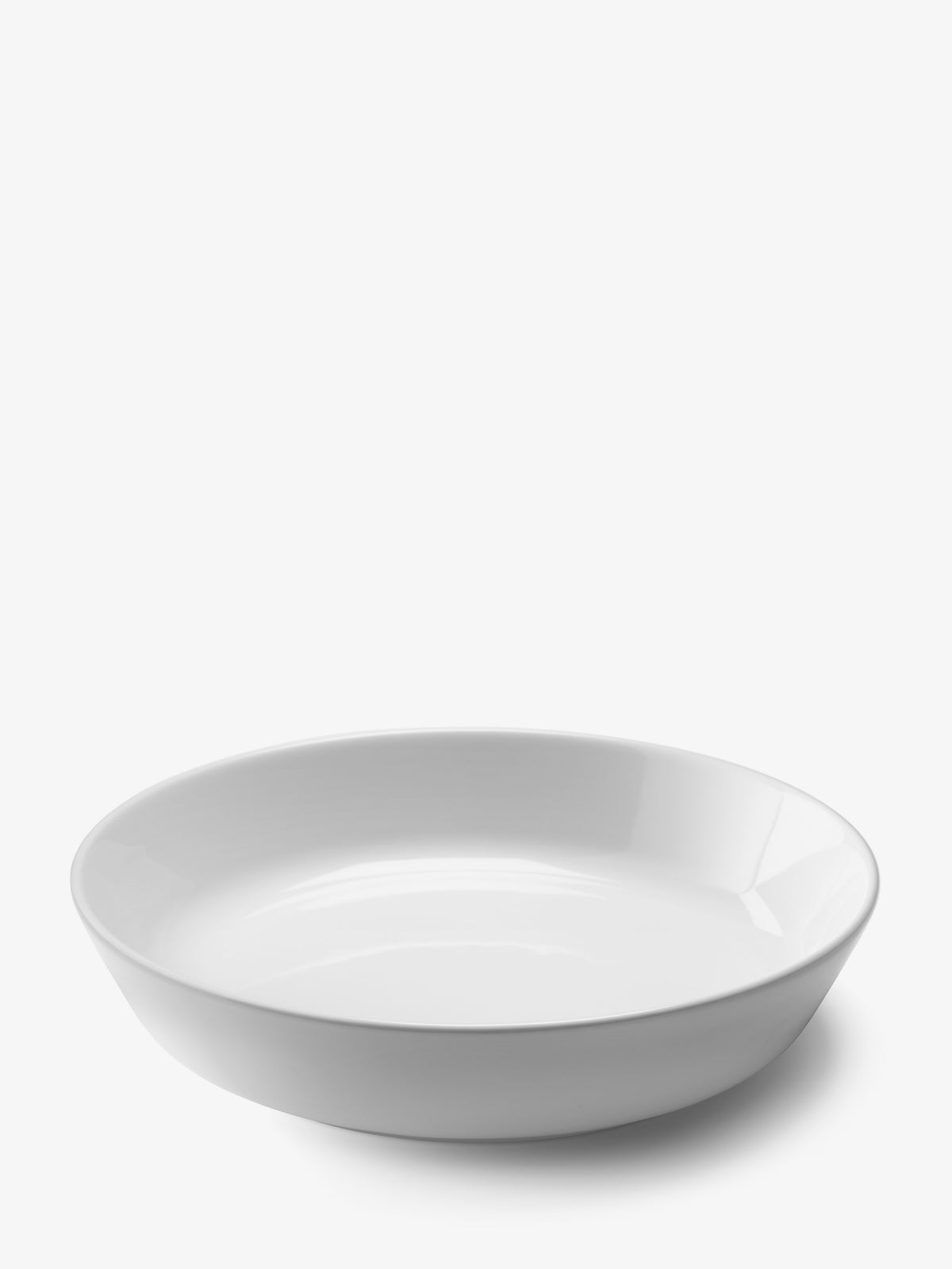 A contemporary white, wide-rimmed shallow Pasta/Serving Bowl by LSA International.