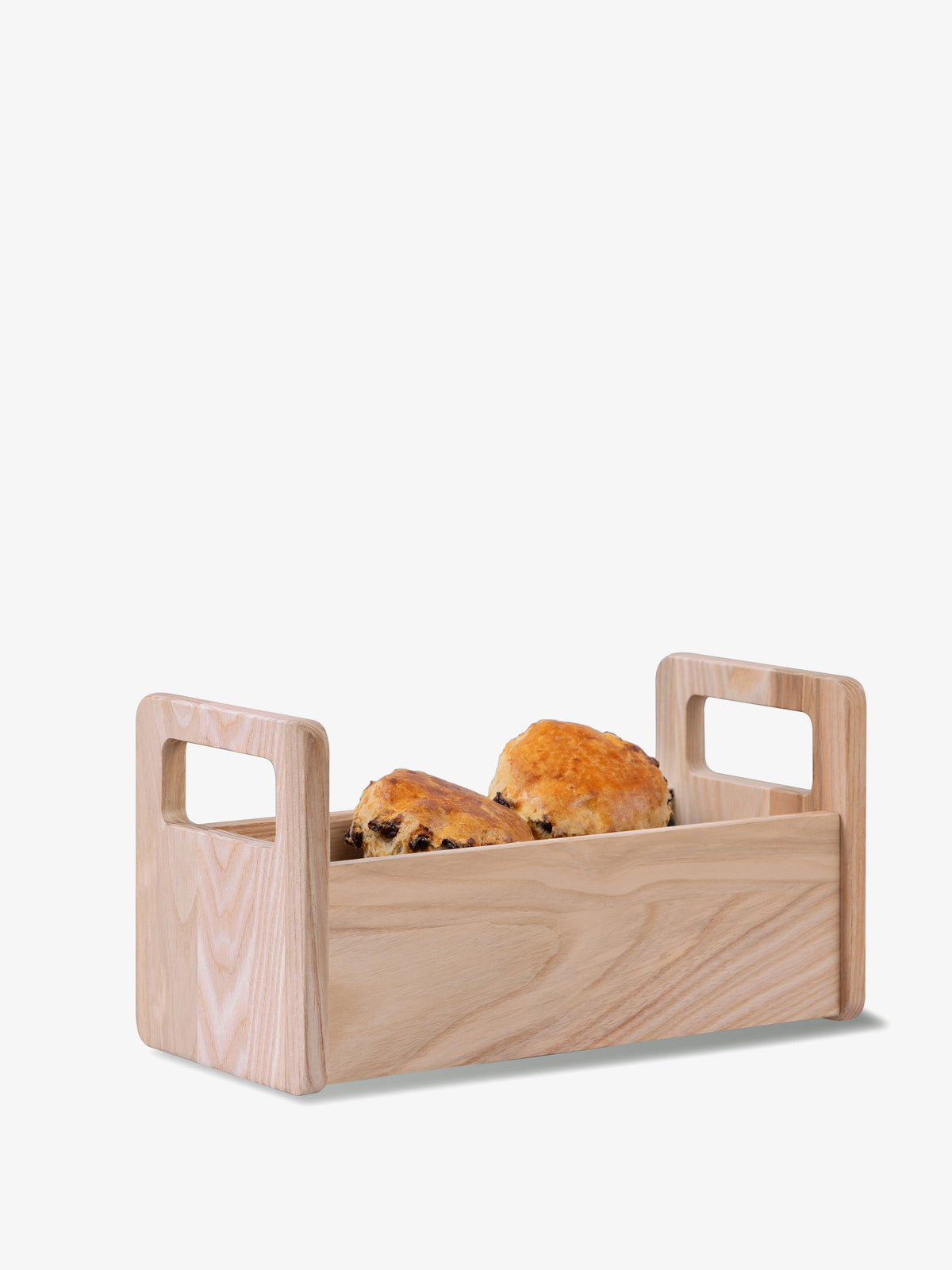 LSA International Ash Bread Basket in untreated European ash with cut-out handles containing two baked goods.