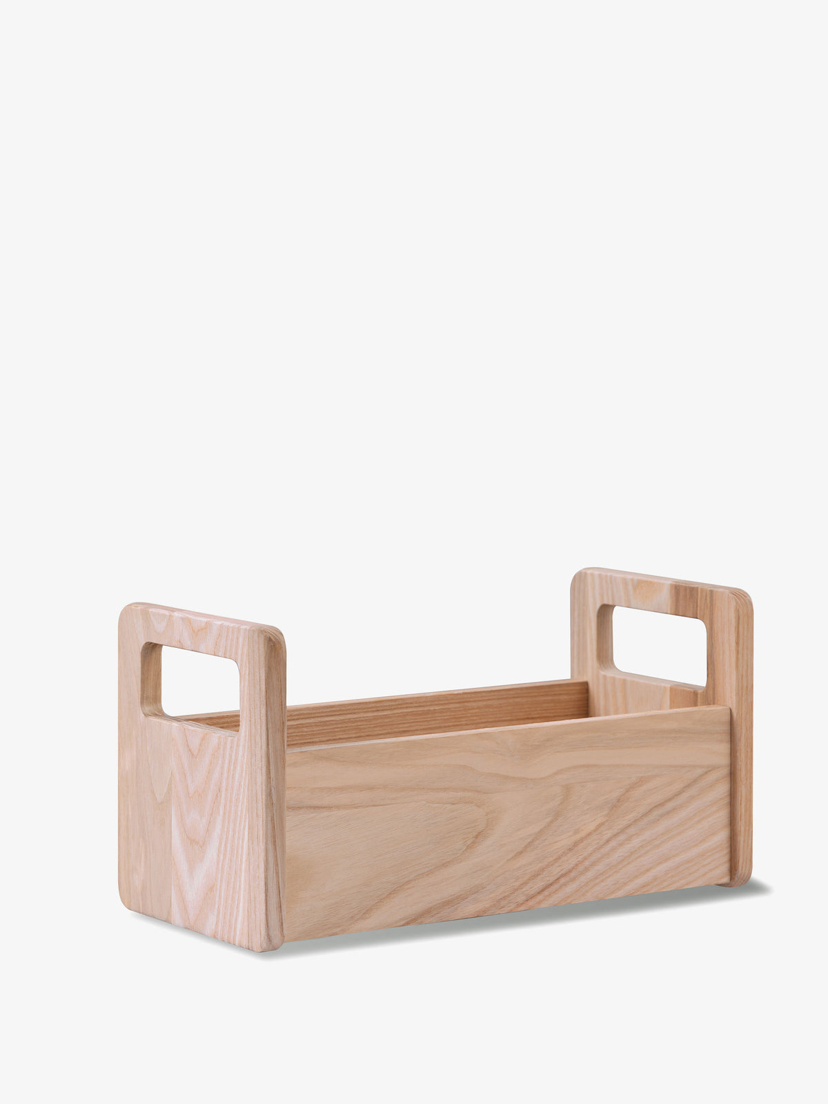 Rectangular untreated European ash Ash Bread Basket with integrated cutout handles on the short ends.