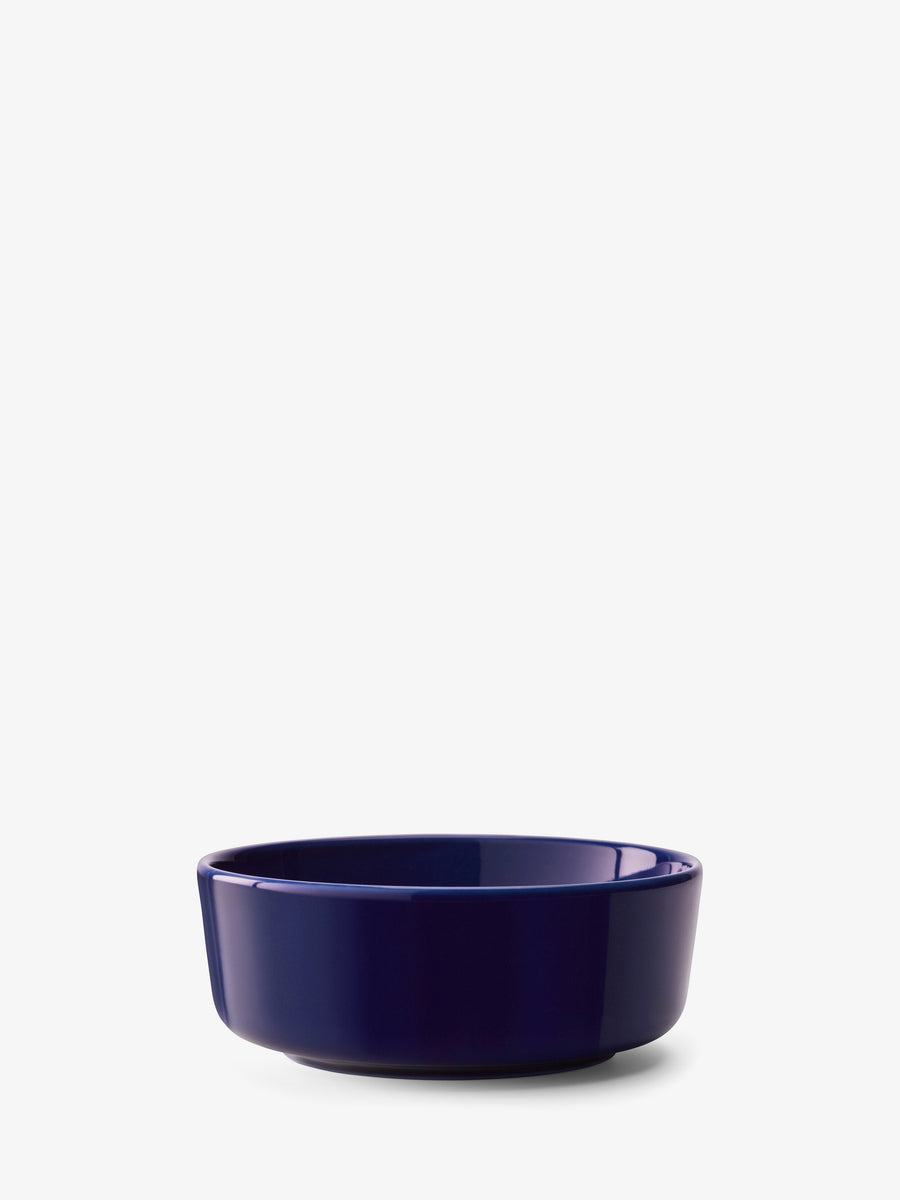 A lsa-international Cereal/Soup Bowl in a rich, deep blue porcelain is centered on a white background, showcasing the refined elegance of modern tableware and offering the convenience of being dishwasher safe.